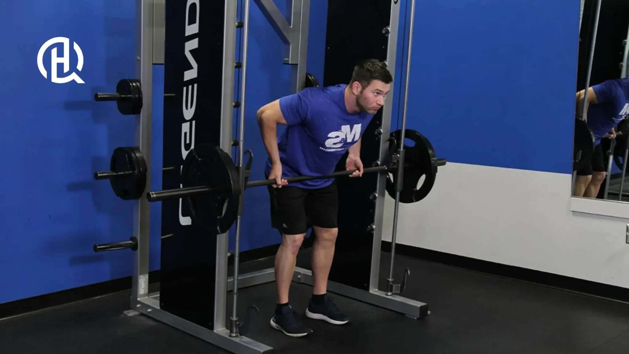 A person doing a row in a smith machine