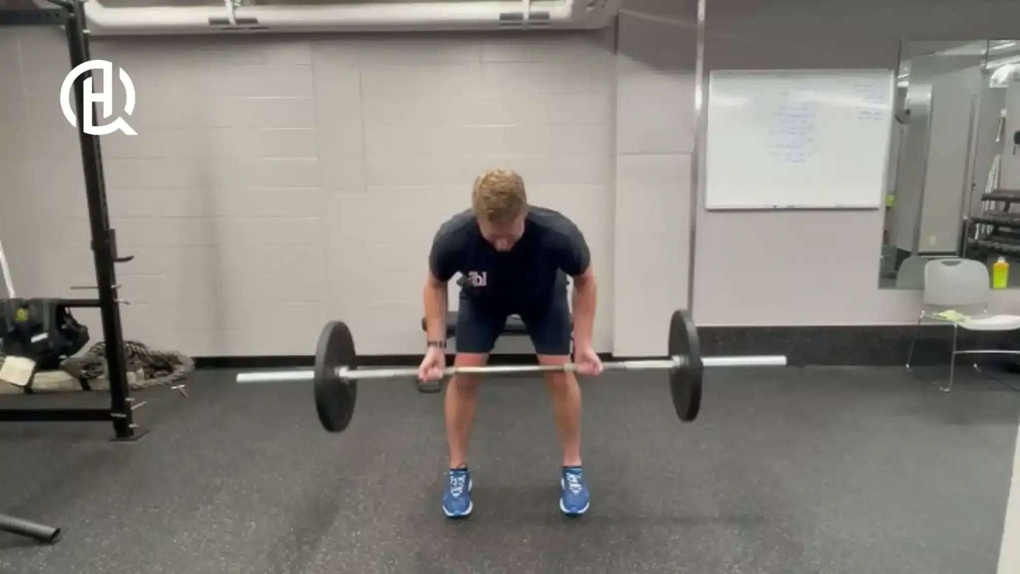 A person doing a barbell row