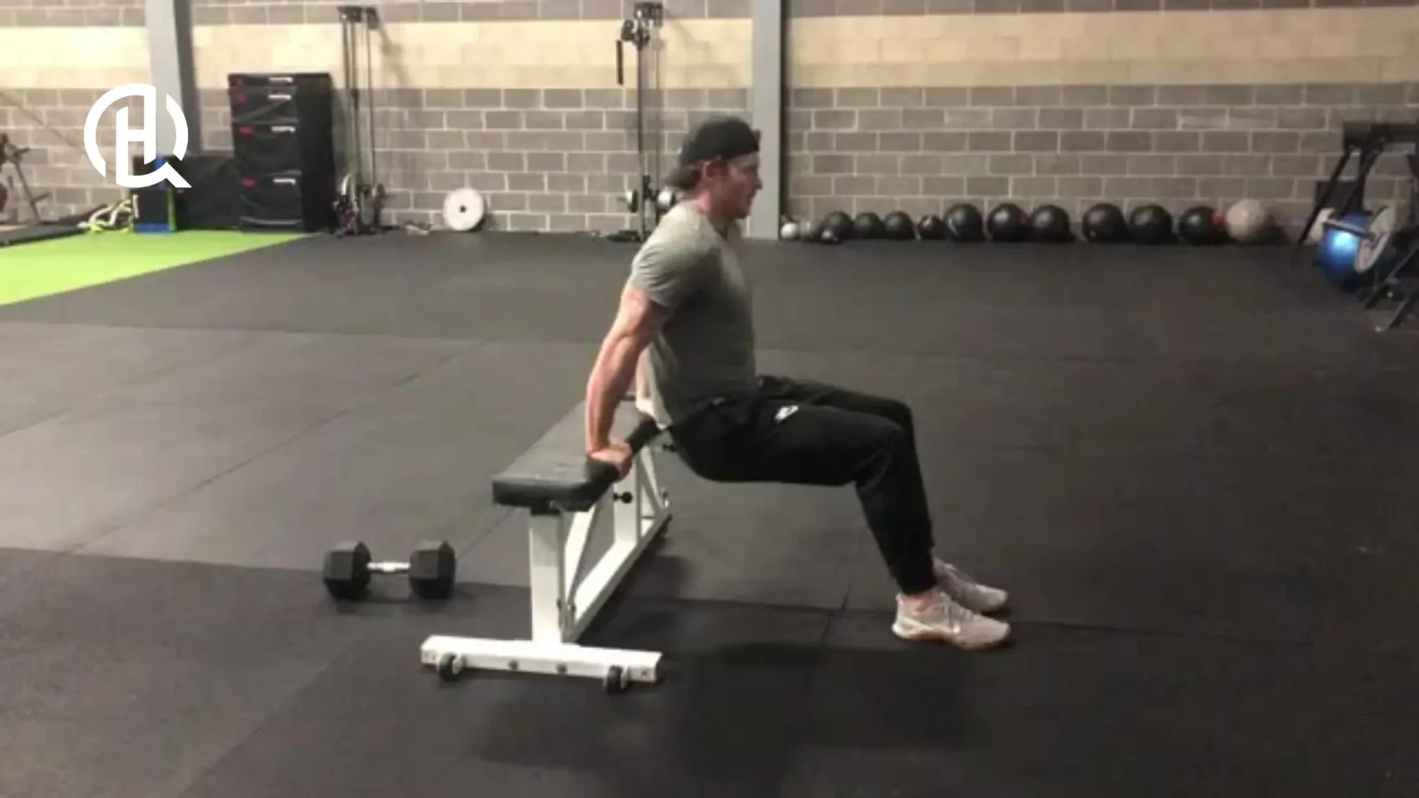 Man doing Bench Dips with bent legs