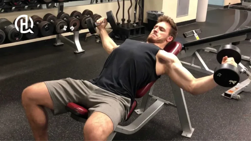 Man doing inclined barbell fly