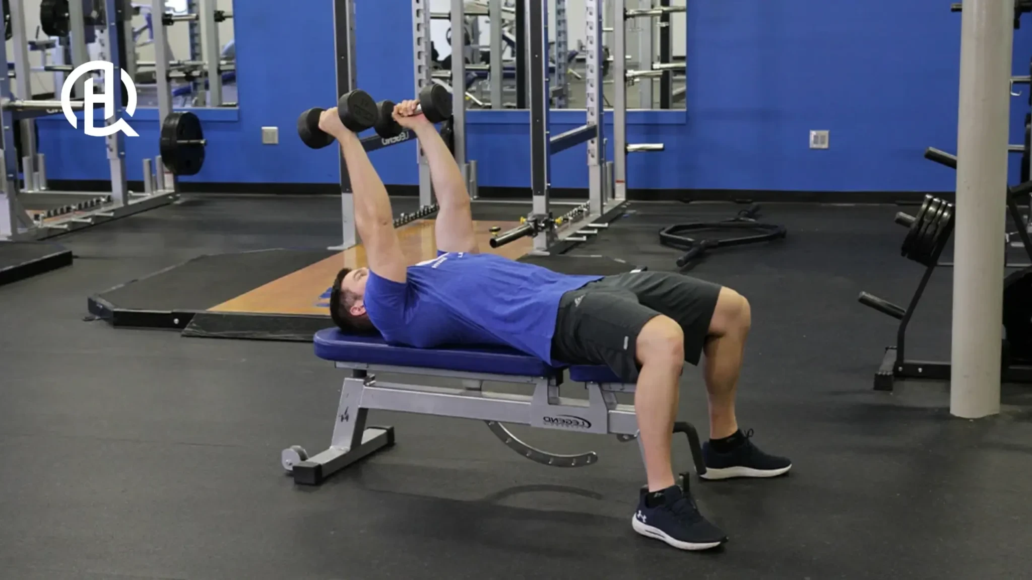 Man starting light with lying triceps extension
