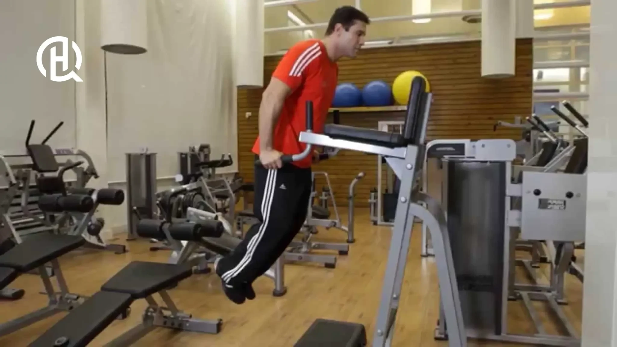 Man doing parallel bar dips on a dips rack