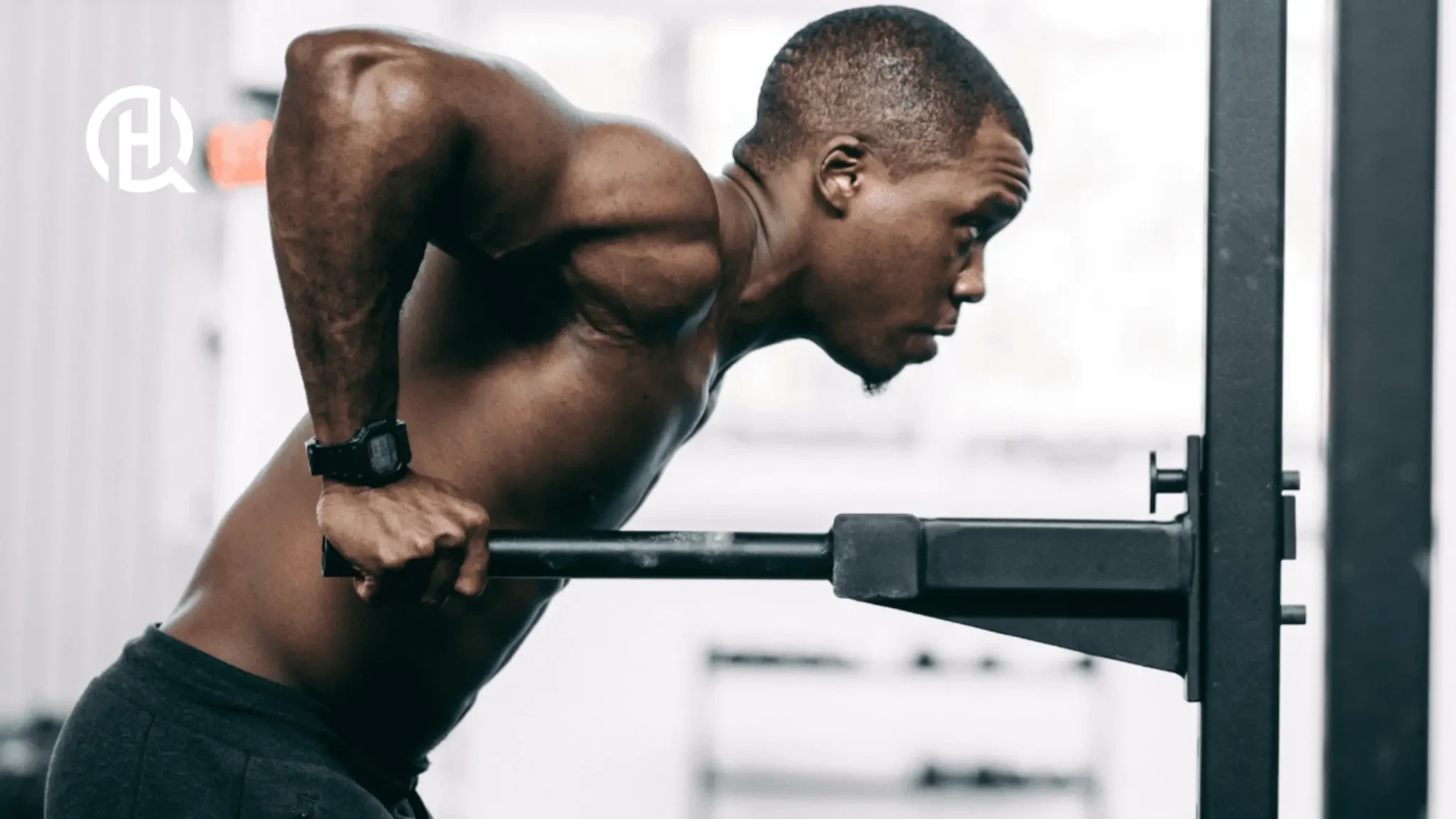 Man doing parallel bar dips maintaining neutral spine