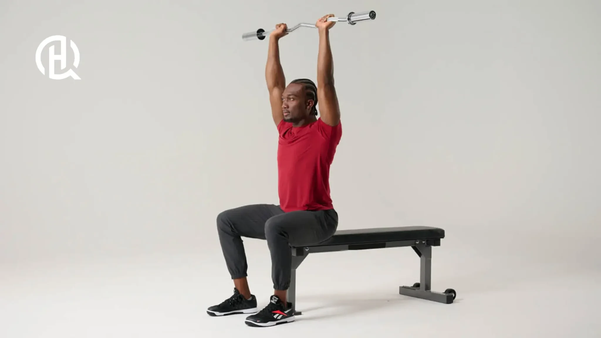 Man demonstrating bar path for French press