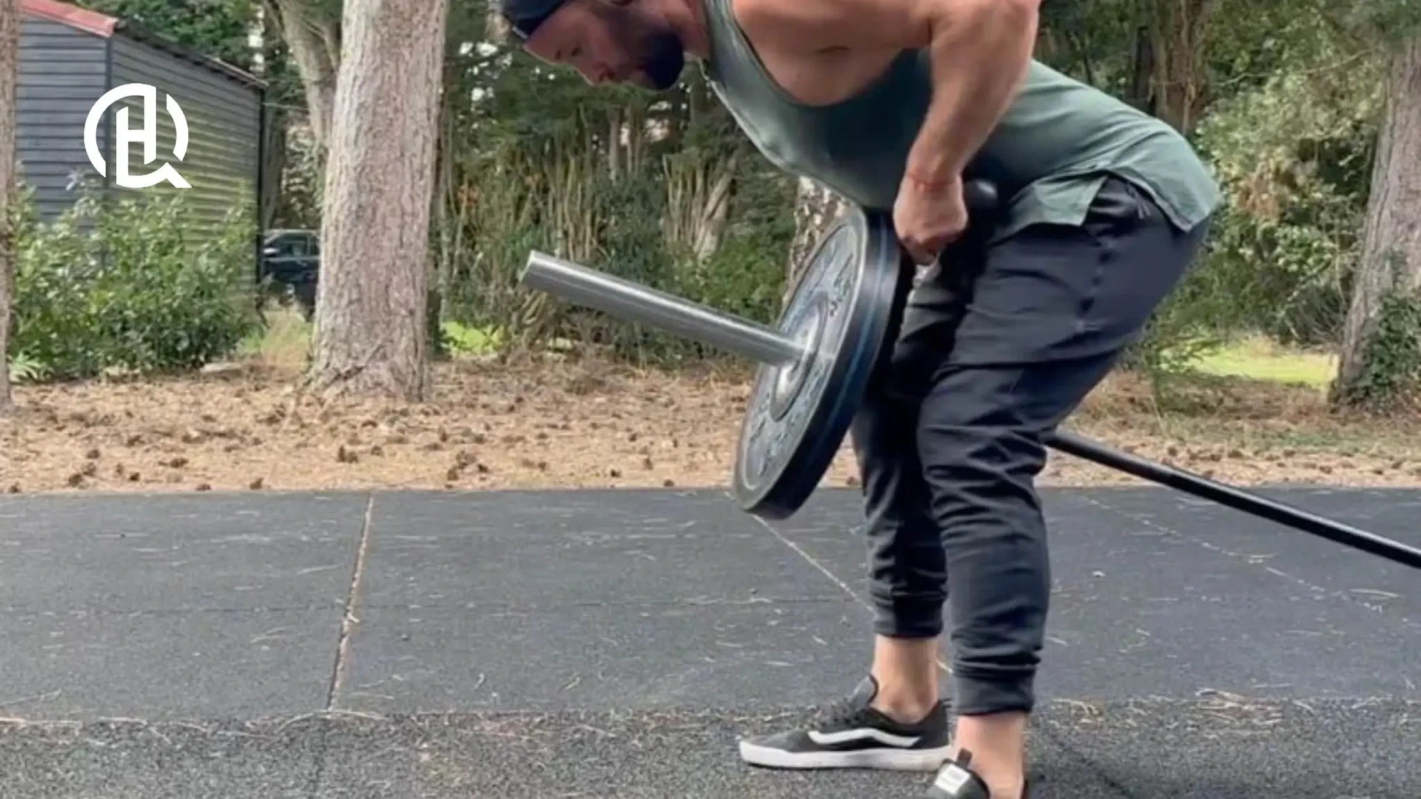 Squeezing shoulder blades together on T-Bar Row